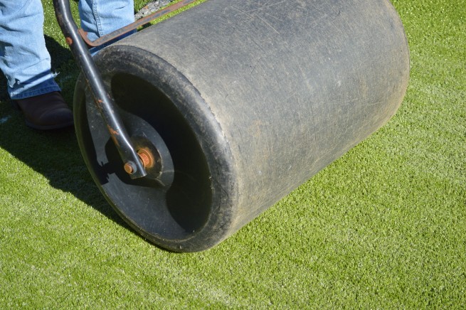 Flagstaff artificial grass installation - top layer rolled